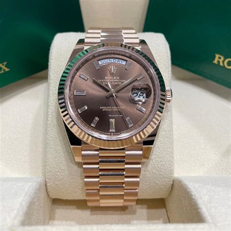 rolex day date 40 rose gold pave dial rvr bezel